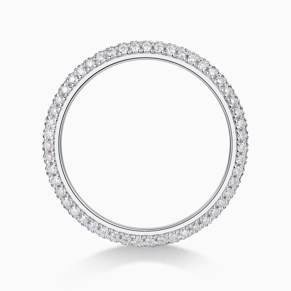 Round moissanite pavé wedding band top view, stones evenly set around the band