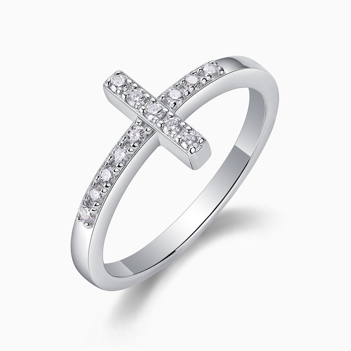 Moissanite cross band ring, angled view showing pavé cross detail and band