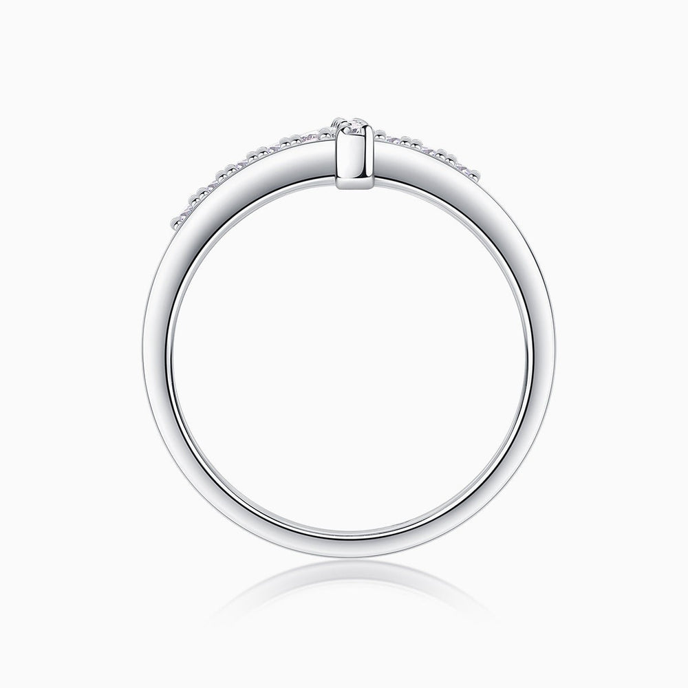 Thin cross band ring, top view with pavé stones and squared cross setting