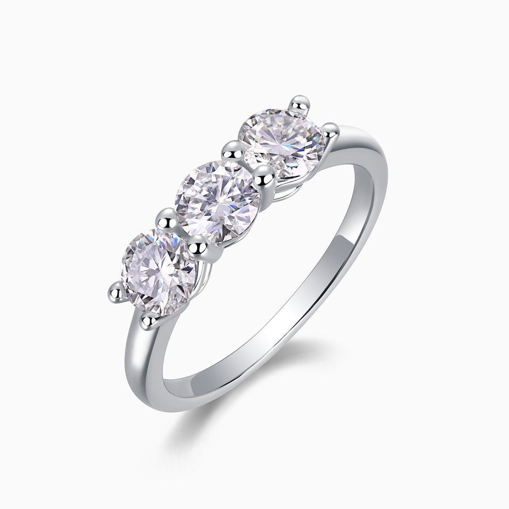 Angle view of three-stone moissanite wedding band in white gold vermeil with round stones