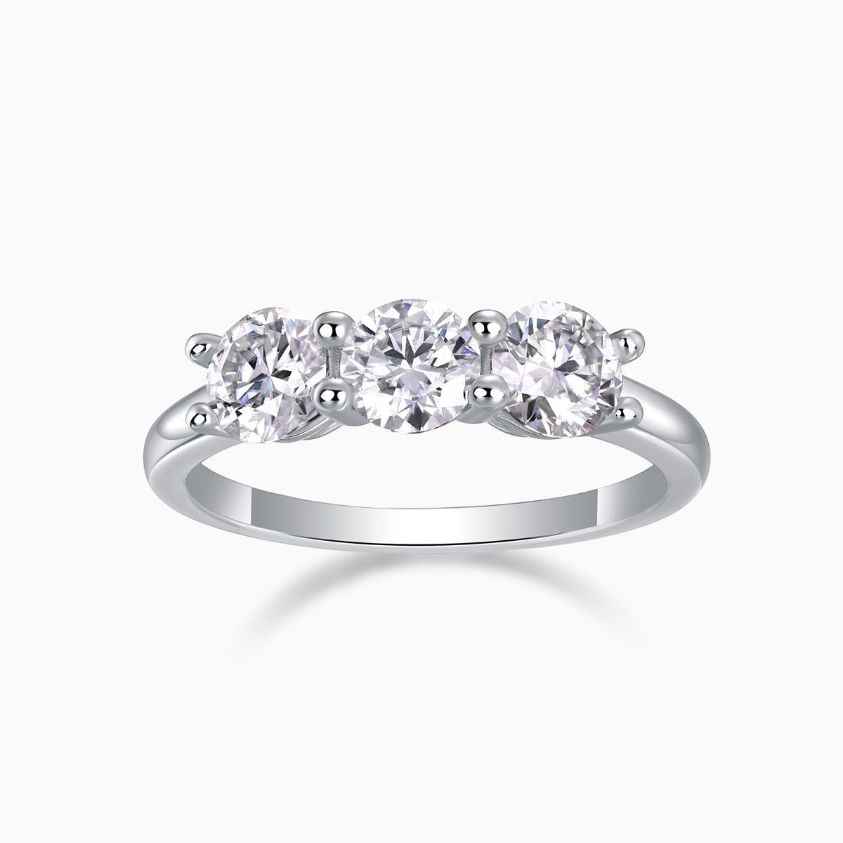 Three-stone moissanite wedding band in white gold vermeil with three round stones