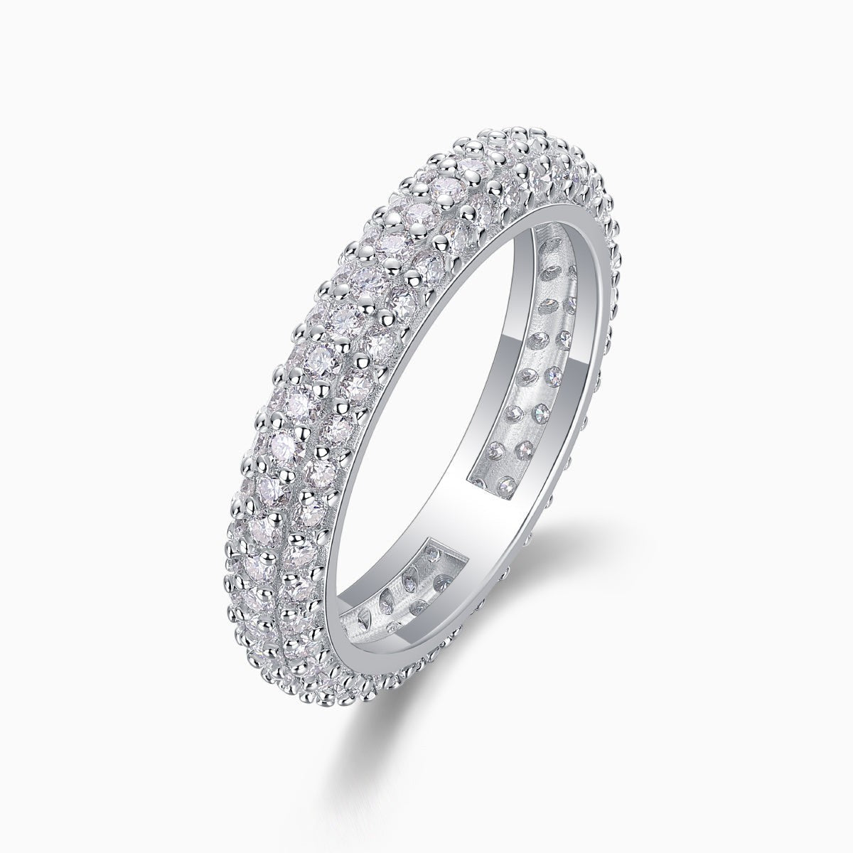 Triple-row pavé moissanite band ring, side view with continuous gemstone band.