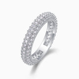 Triple-row pavé moissanite band ring, side view with continuous gemstone band.