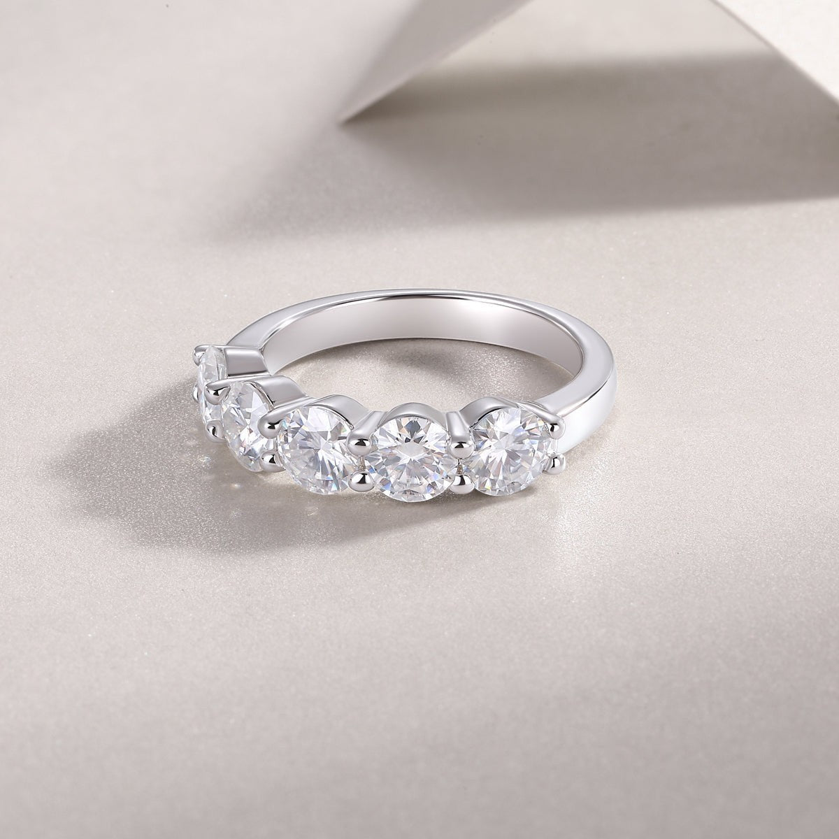 Five-stone moissanite wedding band, white gold vermeil, side profile