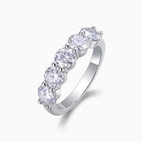 Five-stone moissanite wedding band, white gold vermeil, angled view of five stones