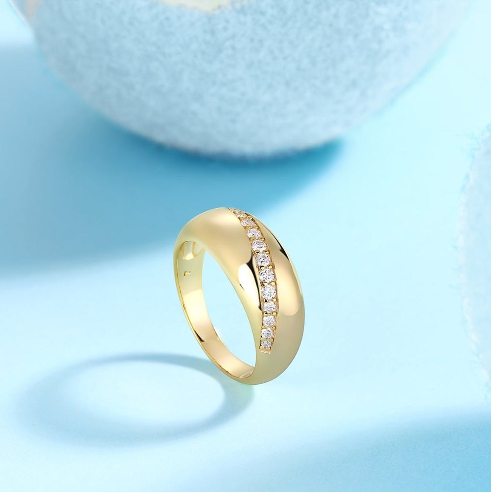 Yellow gold vermeil dome band with a row of white moissanite stones