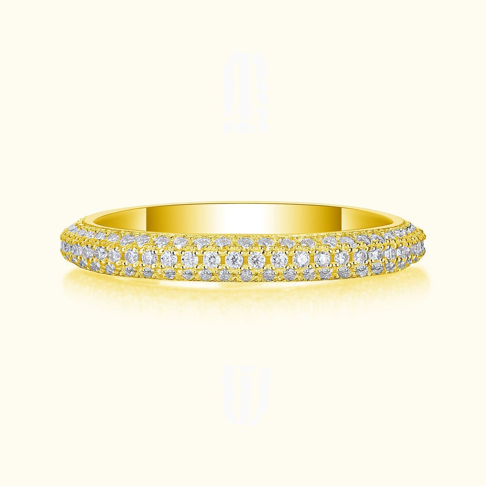Yellow gold vermeil pavé moissanite wedding band with round stones across the band